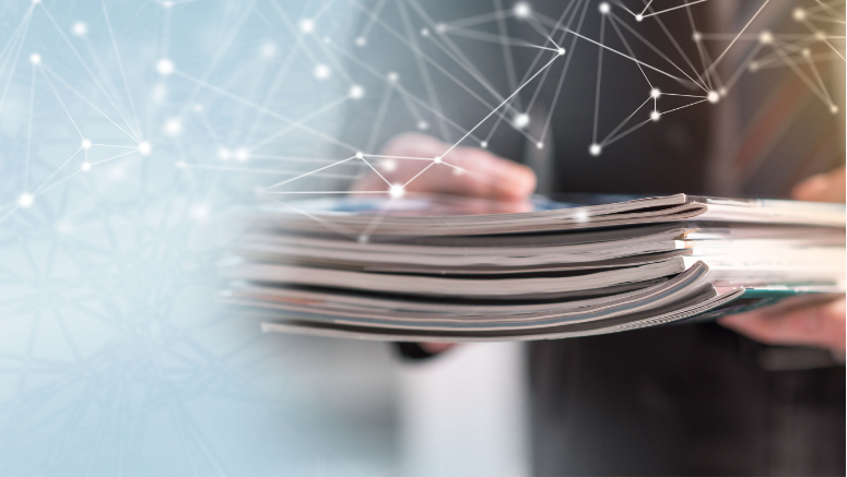 A healthcare professional holding latest scientific publications